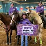 Sequim Equestrian Team members are all smiles after a successful third district meet in early April. Pictured, from left, are Libby Swanberg, Mia Kirner and Joanna Seelye. Submitted photo