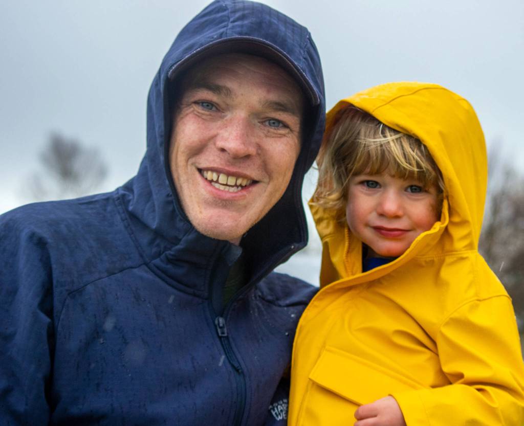 Sequim Gazette photos by Emily Matthiessen
Dustin Scott, 2, collected numerous eggs before being carried home by his father, who said, Were in the snow in Easter! expressing the surprise many felt at the sudden hail, snow and thunderstorm that descended on Sequim briefly. Scott and others enjoyed KSQM 91.5 FM and The Pumpkin Patchs Easter egg hunt despite weather that created a smaller than expected turnout.