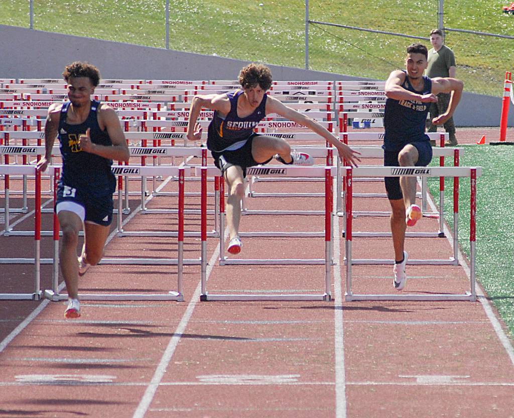 Sequims Adrian Brown races to a sixth-place finish in the 110-meter hurdles finals at the Gear Up Eason Invitational on April 23. Photo by Joanne Huemoeller