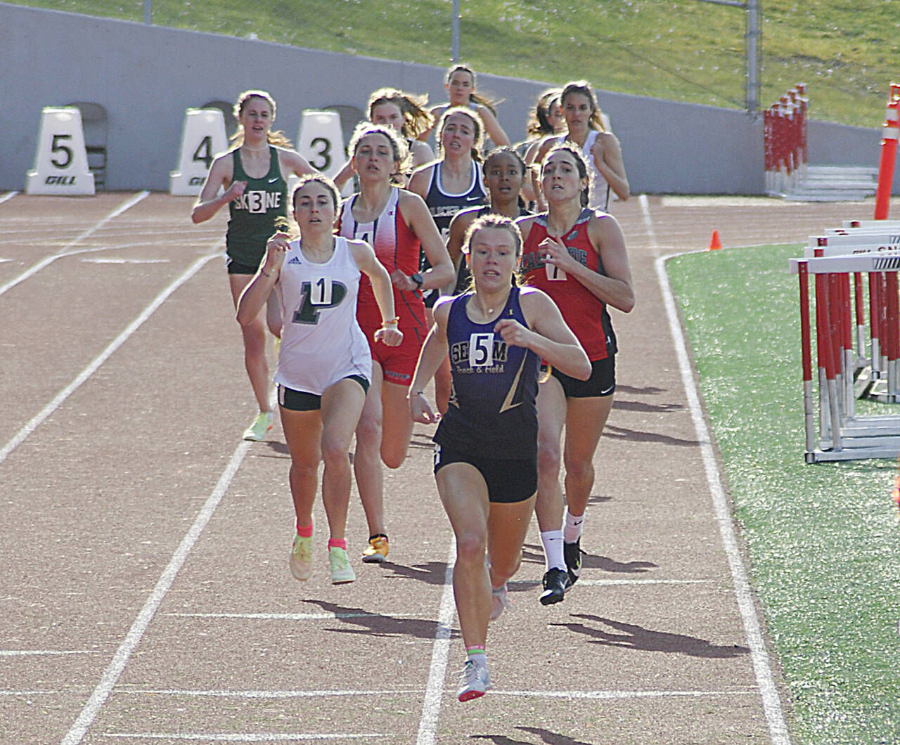 Sequims Riley Pyeatt races to a win in the 800 meter race at the at the Gear Up Eason Invitational on April 23. Photo by Joanne Huemoeller