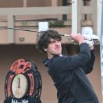 Sequim's Cole Smithson tees off on the first hole in an April 21 match against Bainbridge. Sequim Gazette photo by Michael Dashiell