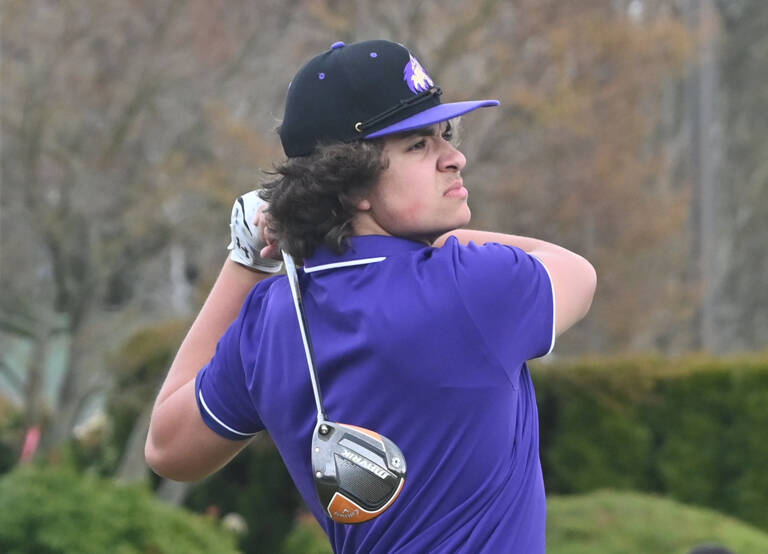 Sequim's Lars Wiker tees off on the first hole in an April 21 match against Bainbridge. Sequim Gazette photo by Michael Dashiell