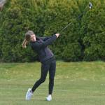 Sequim's Hanna Wagner tees off on the first hole in an April 21 match against Bainbridge. Sequim Gazette photo by Michael Dashiell