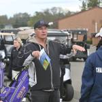Sequim girls golf coach Tim Lusk talks with Sequim and Bainbridge players before an April 21 Olympic League match at The Cedars at Dungeness. Sequim Gazette photo by Michael Dashiell