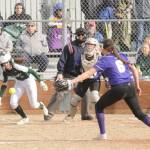 Sequim Gazette photos by Michael Dashiell
Port Angeles Zoe Smithson looks for a hit as Sequim catcher Christy Grubb and pitcher Angel Wagner defend the play in PAs 14-7 win in Sequim on April 19.