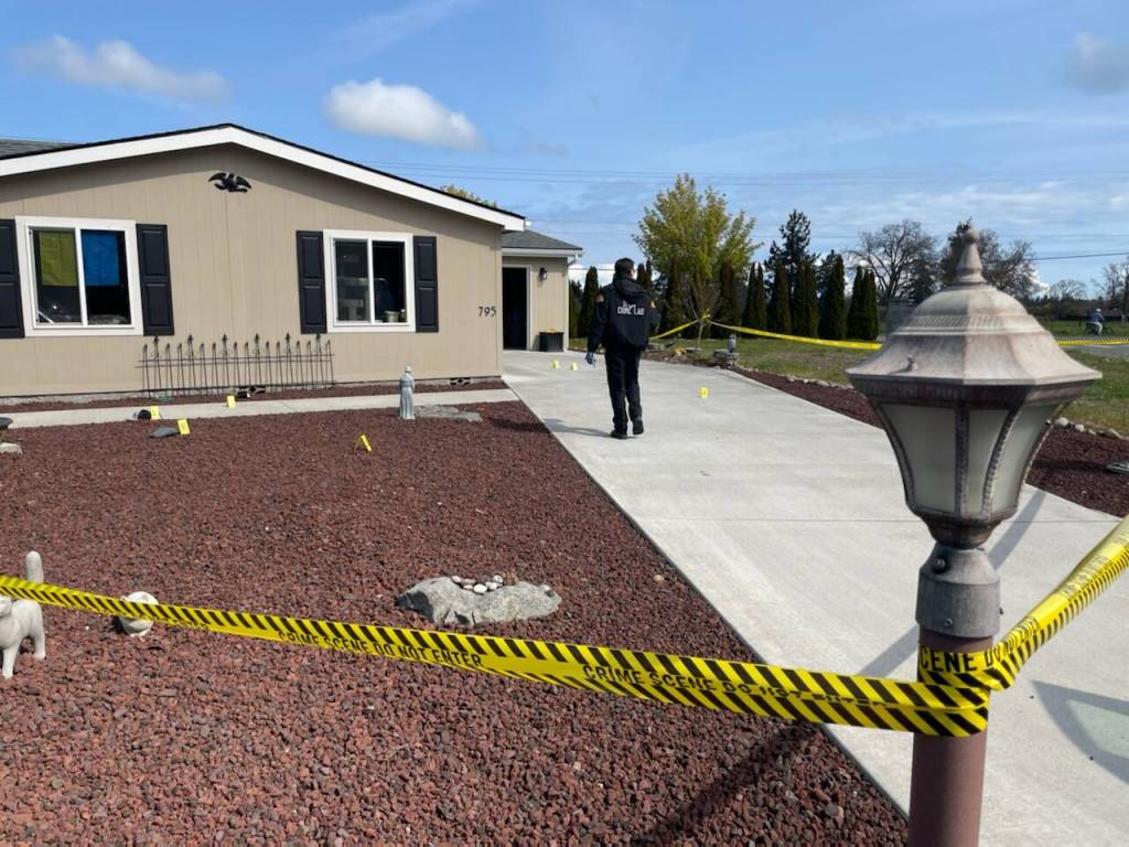 Sequim Gazette photo by Matthew Nash
Washington State Patrols Crime Scene Response Team survey a scene near West Hendrickson Road on April 28 where a Sequim man allegedly tried to shoot his neighbor the evening prior.