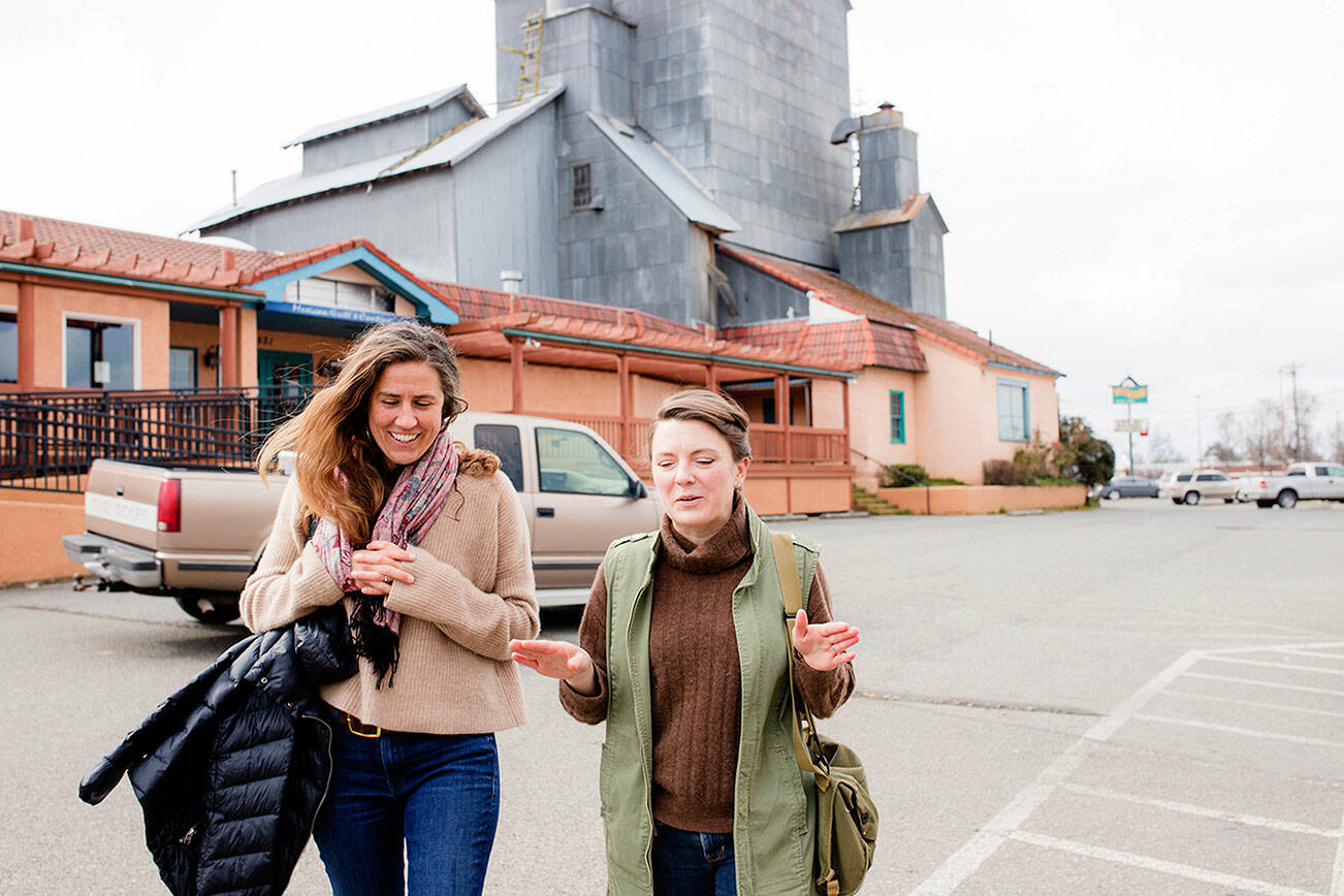 Olympic Angels founder Morgan Hanna of Port Townsend, left, and Love Box volunteer Quinn Mitchell take a walk in Sequim, Mitchells home town, to talk about Olympic Angels expansion into Clallam County. Photo courtesy of April Thompson/Olympic Angels