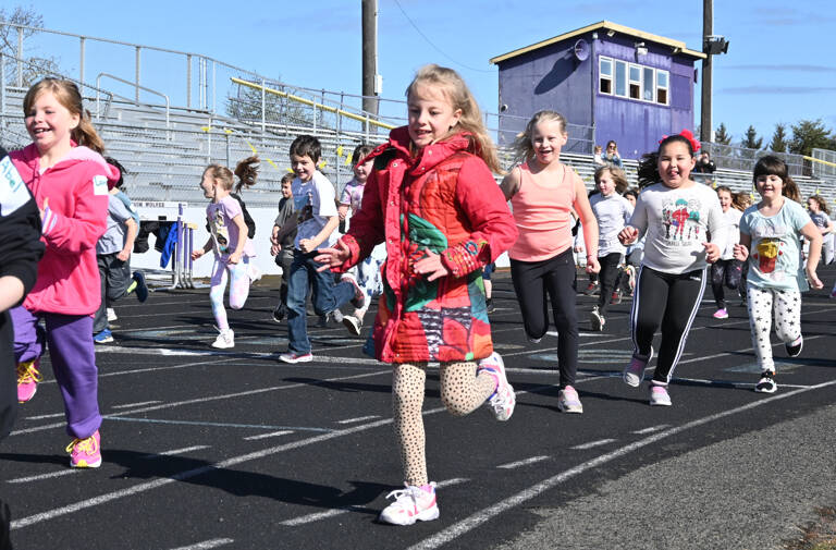 First-graders kick off Helen Haller Elementary's School's annual Fun Run, held on Earth Day (April 22). Sequim Gazette photo by Michael Dashiell