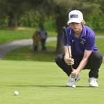 Sequim Gazette photo by Michael Dashiell
Sequims Ben Sweet lines up a putt on the 10th hole in an April 28 Olympic League match against North Kitsap.
