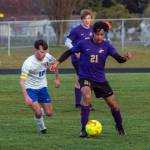 Sequim Gazette photos by Emily Matthiessen
Sequims Mekhi Ashby, right, looks for space and an open teammate in the Wolves April 26 Olympic League game against Bremerton, as the Knights Jeremy Ford pursues the play.