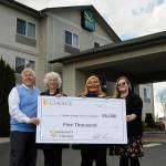Matthew Nash/Sequim Gazette
Bret Wirta, owner of the Quality Inn and Suites in Sequim, on left, with General Manager Yolanda Pompa and Kaittlyn Reese, assistant general manager, present Betsy Reed Schultz, executive director of the Captain Joseph House Foundation, second from left, $5,000 to help bring families to the Port Angeles home for respite and support. Pompa applied for the grant through the hotels parent franchise Choice Hotels.