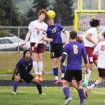 Michael Dashiell/Sequim Gazette
Sequims Aidan Henninger (11) and Kingstons Marshall Kilpatrick battle for the ball in the first half of Sequims 4-0 Senior Night victory.