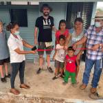 Photo courtesy of David Piper
Locals hold a ribbon cutting for the new home of Margarita Chuga, second from right, and her three children. She was widowed last year, and the late-Mike Piper paid for it before his passing and his son David, third from left, wanted to help build it in Chiquimulilla, Guatemala.