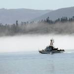Keith Thorpe/Olympic Peninsula News Group
The U.S. Coast Guard cutter Cuttyhunk sails across Port Angeles Harbor against a backdrop of fog hugging the shoreline in June 2020.