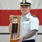 Chief Warrant Officer Daniel Garver received the Coast Guard Cutter Cuttyhunks commissioning pennant during a ceremony held Thursday, May 5, 2022, at Air Station Port Angeles. The ceremony was held to decommission the Cuttyhunk, and Garver, the vessels commanding officer, received the pennant in accordance with tradition. Photo by U.S. Coast Guard photo by Petty Officer 3rd Class Michael Clark