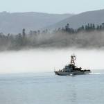 The U.S. Coast Guard cutter Cuttyhunk sails across Port Angeles Harbor against a backdrop of fog hugging the shoreline. in June 2020. Photo by Keith Thorpe/Olympic Peninsula News Group