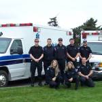 Submitted photo
Staff with Olympic Ambulance pose with Ambulances being donated to communities in Latin American and Caribbean countries.