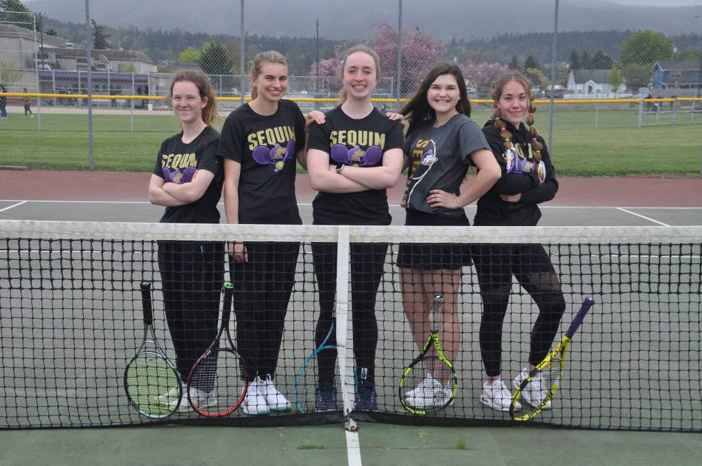 Photo by Wendy Morey
Seniors from Sequim Highs girls tennis team celebrate their Senior Night on May 3, a home match against Kingston. Pictured, from left, are Ruby Romano, Aidyn Shingleton, Malory Morey, Allie Gale and Jordan Hegtvedt. Gale, Hegtvedt and Morey each advanced to the district tourney.