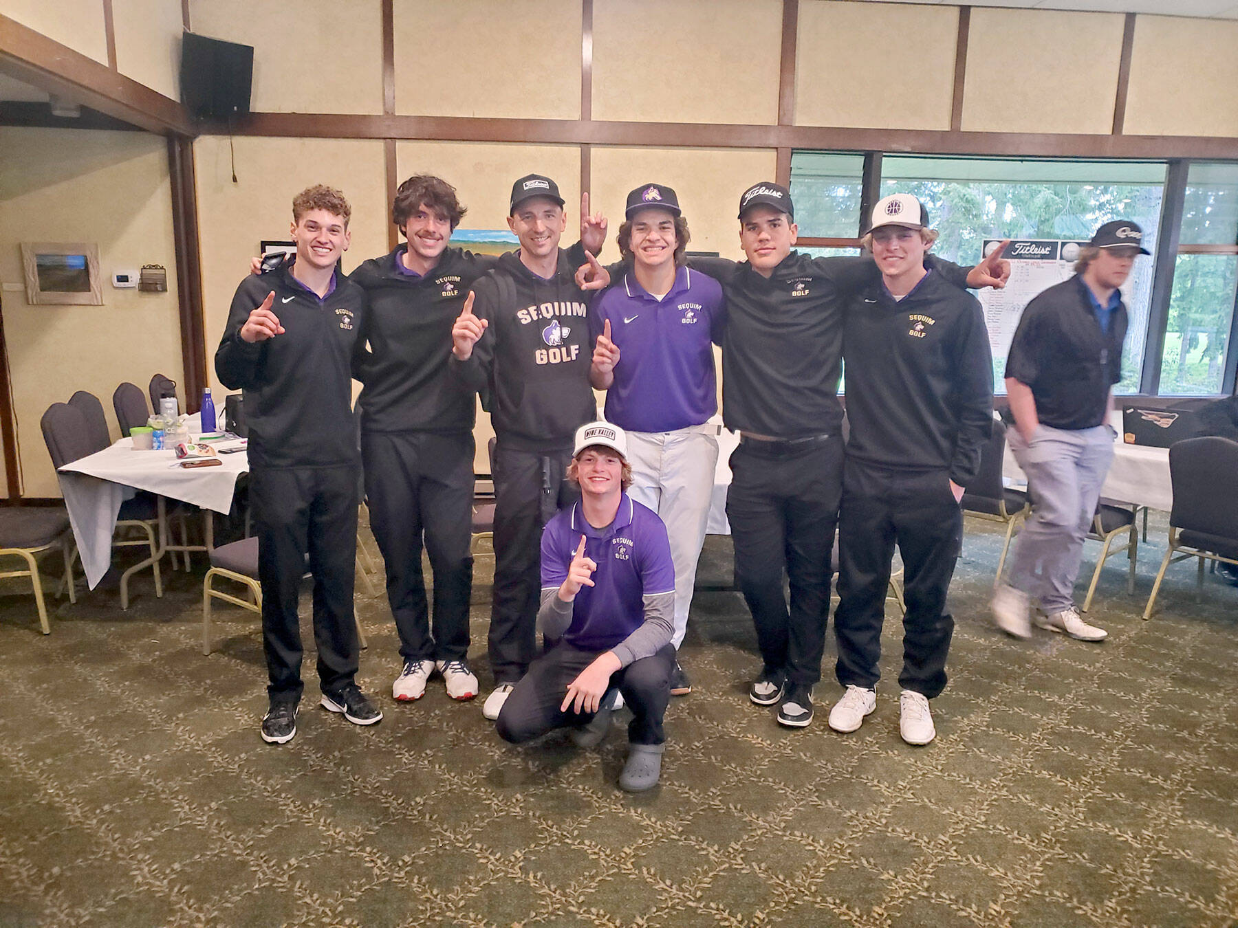 Submitted photo 
The Sequim boys golf team celebrate a 19-stroke victory in the Olympic League Boys Golf Championships held May 9 at Kitsap Golf & Country Club. Sequims Ben Sweet (kneeling) won the individual league title by one stroke over teammate Dominic Riccobene, far left. The Wolves also finished the Olympic League regular season with an undefeated record. Team members are, from left, Riccobene, Cole Smithson, head coach Sean OMera, Lars Wiker, Pryce Glasser, Zackary Thompson and Sweet.