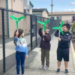 Submitted photo
From left, Natalie Tripp, Christian Furnish and Manuel Yanez, students at Helen Haller Emenrtary, test wind turbines.