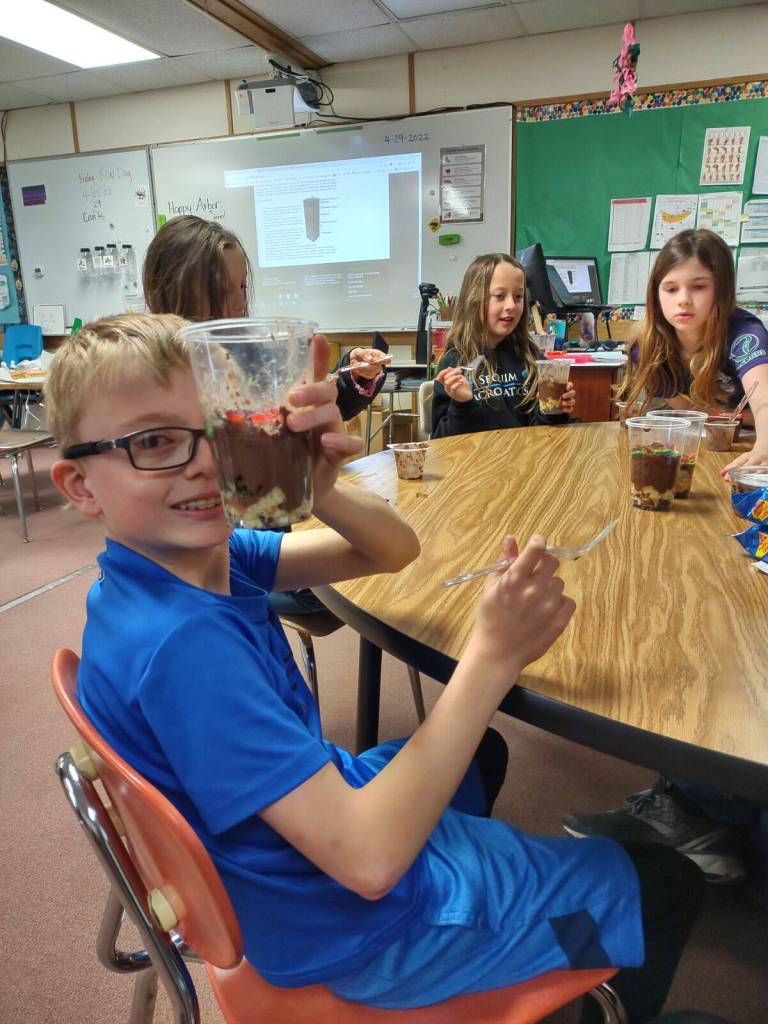 Submitted photo
From left, students Dalton Wilkinson, Ellie Roedell and Selene Dorkin make layers of soil in a recent lesson at Helen Haller Elementary School.