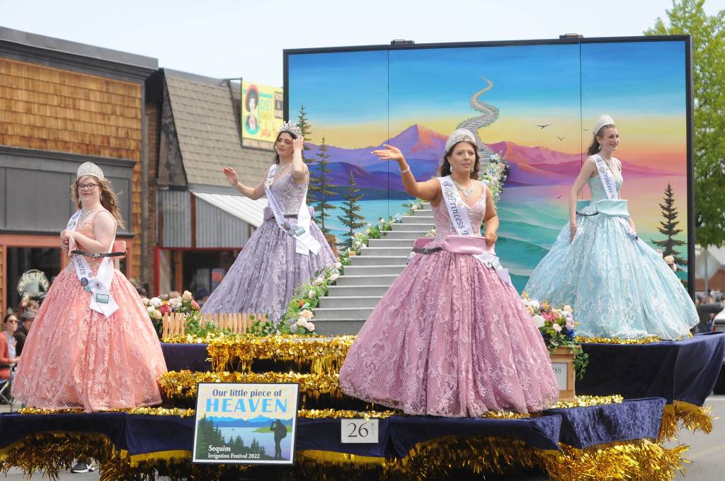 SEQUIM GAZETTE PHOTO BY Michael Dashiell
This years Sequim Irrigation Festival royalty wave to the crowd at the fests Grand Parade on May 14. Pictured, from left, are princess Lauren Willis, queen Isabella Williams, and princesses Ellie Turner and Katherine Gould.
