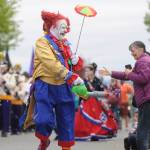 Michael Dashiell/Sequim Gazette
Ed Matuska, a clown with the Olympic Peninsula Shriners, delights the Sequim Irigation Festival Grand Parade crowd with bubbles and smiles Saturday afternoon.