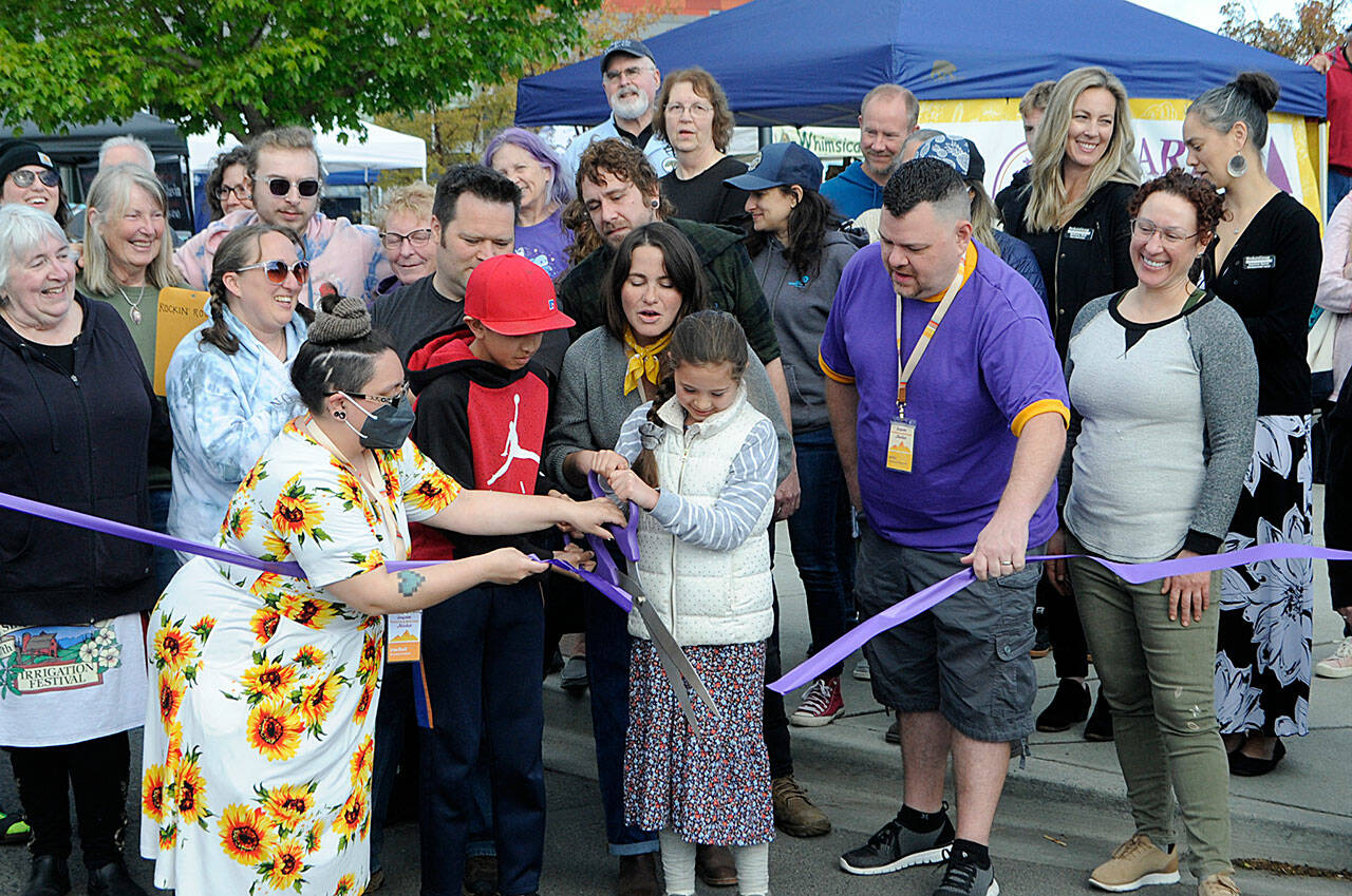 Vendors within the Sequim Farmers and Artisans Market celebrated opening day on May 14 with a ribbon cutting ceremony held by the Sequim-Dungeness Valley Chamber of Commerce. Eleven-year-old Isaac Gonzalez-Tapia with Oceanside Nursery and Claire Unruh, 8, with Jembe Farms cut the ribbon with help from the markets board president Rachel Anderson, executive director Emma Jane Garcia and vice president Eric Pickens. More than 55 vendors set up at the Sequim Civic Center Plaza and in its neighboring parking lot each Saturday from 
9 a.m.-2 p.m. through Oct. 29. For more information, visit sequimmarket.com.