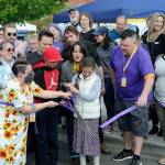 Vendors within the Sequim Farmers and Artisans Market celebrated opening day on May 14 with a ribbon cutting ceremony held by the Sequim-Dungeness Valley Chamber of Commerce. Eleven-year-old Isaac Gonzalez-Tapia with Oceanside Nursery and Claire Unruh, 8, with Jembe Farms cut the ribbon with help from the markets board president Rachel Anderson, executive director Emma Jane Garcia and vice president Eric Pickens. More than 55 vendors set up at the Sequim Civic Center Plaza and in its neighboring parking lot each Saturday from 
9 a.m.-2 p.m. through Oct. 29. For more information, visit sequimmarket.com.