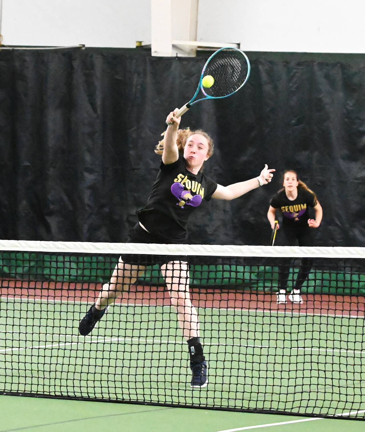 Sequim Gazette photo by Michael Dashiell
Sequims Malory Morey, left, and Jordan Hegtvedt take on Sammamishs Sarah Chianglin and Viv Khuu in the second round of the West Central bidistrict tournament in Bremerton on May 20. Morey and Hegtvedt went 2-2 at the tourney and missed a state berth by one match.