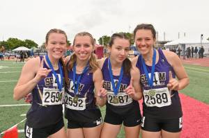 Sequim Gazette photo by Michael Dashiell
Sequim Highs 4x400 relay team celebrates a state title at the 2A state track and field championships at Mount Tahoma High School in Tacoma on May 28. Pictured, from left, are Riley Pyeatt, Hiilei Robinson, Kaitlyn Bloomenrader and Eve Mavy. The team helped Sequims girls place fifth overall. See story, A-7.
