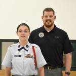 Deputy Commander of Cadets Capt. Nick Sue helps promote Faith Amaya to Cadet Second Lieutenant on May 17. Sequim Gazette photo by Michael Dashiell