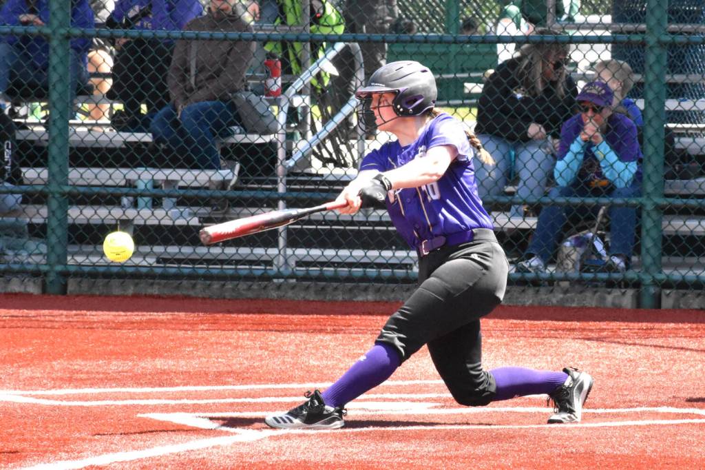 Kevin Hanson/Enumclaw Courier-Herald
Christy Grubb turns on a pitch in the Wolves 21-1 district tourney win over Sammamish on May 20. Grubb,who had a two-RBI double in the victory, was named to the all-Olympic League first team.