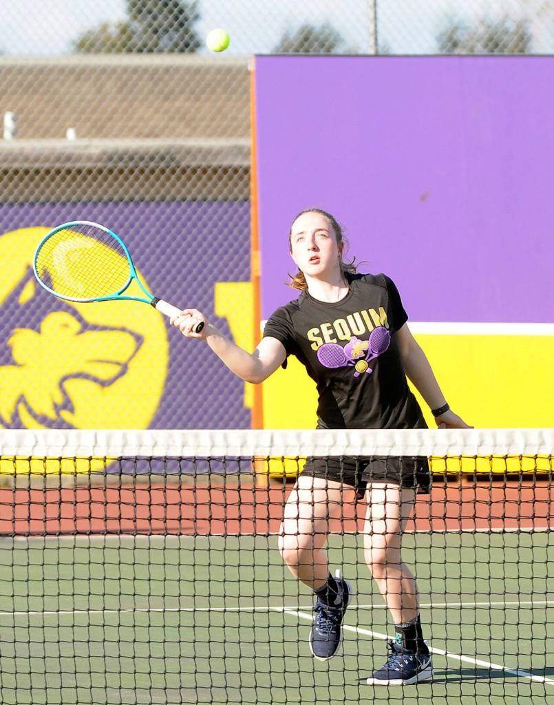 Sequim's Malory Morey and doubles teammate Jordan Hegtvedt sweep North Mason's Emma Hunt and Ava Oldright 6-0, 6-1, on March 22. District tourney qualifiers this spring, both players were named to the all-Olympic League list. Sequim Gazette file photo by Michael Dashiell