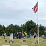 Sequim Gazette photo by Matthew Nash
Phil Capogna, acting sergeant in arms for American Legion Post 62, leads a salute to the flag to honor veterans in the Dungeness Cemetery on Memorial Day.