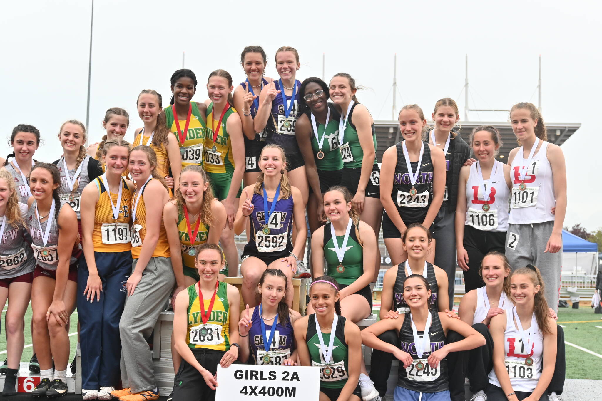 Sequims 4x400 relay team of Kaitlyn Bloomenrader, Riley Pyeatt, Eve Mavy and Hiilei Robinson celebrate a first place finish at the state 2A meet in Tacoma on May 28. Sequim Gazette file photo by Michael Dashiell