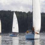 Sailboats gather near the starting line of the Reach for Hospice race on Sequim Bay in September 2021. Sequim Gazette file photo by Michael Dashiell