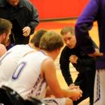 Greg Glasser, Sequim High boys basketball head coach, talks with his team in a game against Ferndale at the Crush the Slush tournament in Port Townsend in December 2018. Sequim Gazette file photo by Michael Dashiell