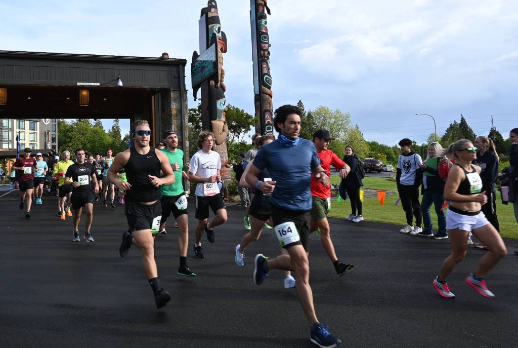 Sequim Gazette photos by Michael Dashiell
Runners break from the starting line of the 2022 North Olympic Discovery marathon at 7 Cedars Resort in Blyn on June 5. The 20th iteration of the Sequim-to-Port Angeles race was expected to draw 350 full marathoners and 20 relay teams to go along with 900 half marathon participants.