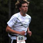 Colby Ellefson nears the end of his North Olympic Discovery Marathon relay segment on June 5. His relay team, Chicken Leg Running Club, finished third. Sequim Gazette photo by Michael Dashiell