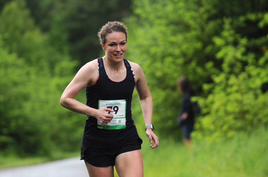 Sequim Gazette photos by Michael Dashiell
Melissa Melough of Seattle pushes uphill on the North Olympic Discovery Course near Sequim on Sunday. An experienced marathoner, Melough won the 2022 race (and placed second overall) in 3:10.53.