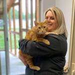 Kitty City manager Michelle Gentry invites community members to check out the Olympic Peninsula Humane Societys new campus at 91 S. Boyce Road at the June 18 open house. Photo courtesy of Olympic Peninsula Humane Society