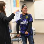 Sequim Gazette photo by Michael Dashiell
Anita Benitez, world languages teacher at Sequim High School, presents a special unicorn award to Jose Ramirez last week for his strong scores in the Washington State Seal of Biliteracy exam.