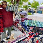 Emma Jane Garcia/Sequim Farmers & Artisans Market
Diane Frandsen of Raggedy Rug Company displays some of her colorful pieces at the Sequim Farmers & Artisans Market.