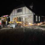 Sequim Gazette photo by Matthew Nash
Nickel Bros crews began unloading a 4,000-square-feet house around 11:30 p.m. June 8 in Dungeness after they awaited high tide.