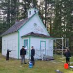 Andy Benitez, second from left, and fellow Scouts BSA members repaint of the Blue Mountain School earlier this year, Benitezs culminating Eagle Scout project. Submitted photo