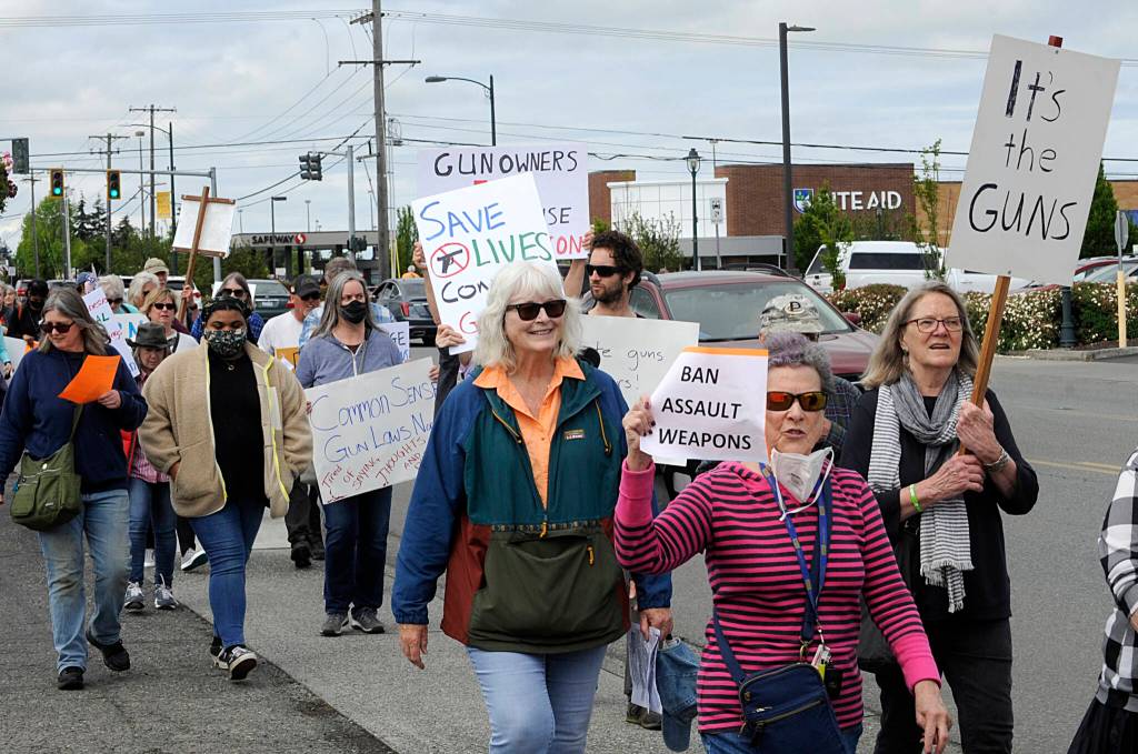 Sequim Gazette photo by Matthew Nash/ About 200 people marched with the June 11 Sequim March for Our Lives event along Washington Street protesting gun violence and advocating for stricter gun control.