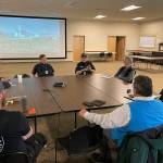 Sequim Gazette photo by Matthew Nash/ First responders and business retail leaders meet on June 16 to discuss logistics for food and supply distribution during a natural disaster.