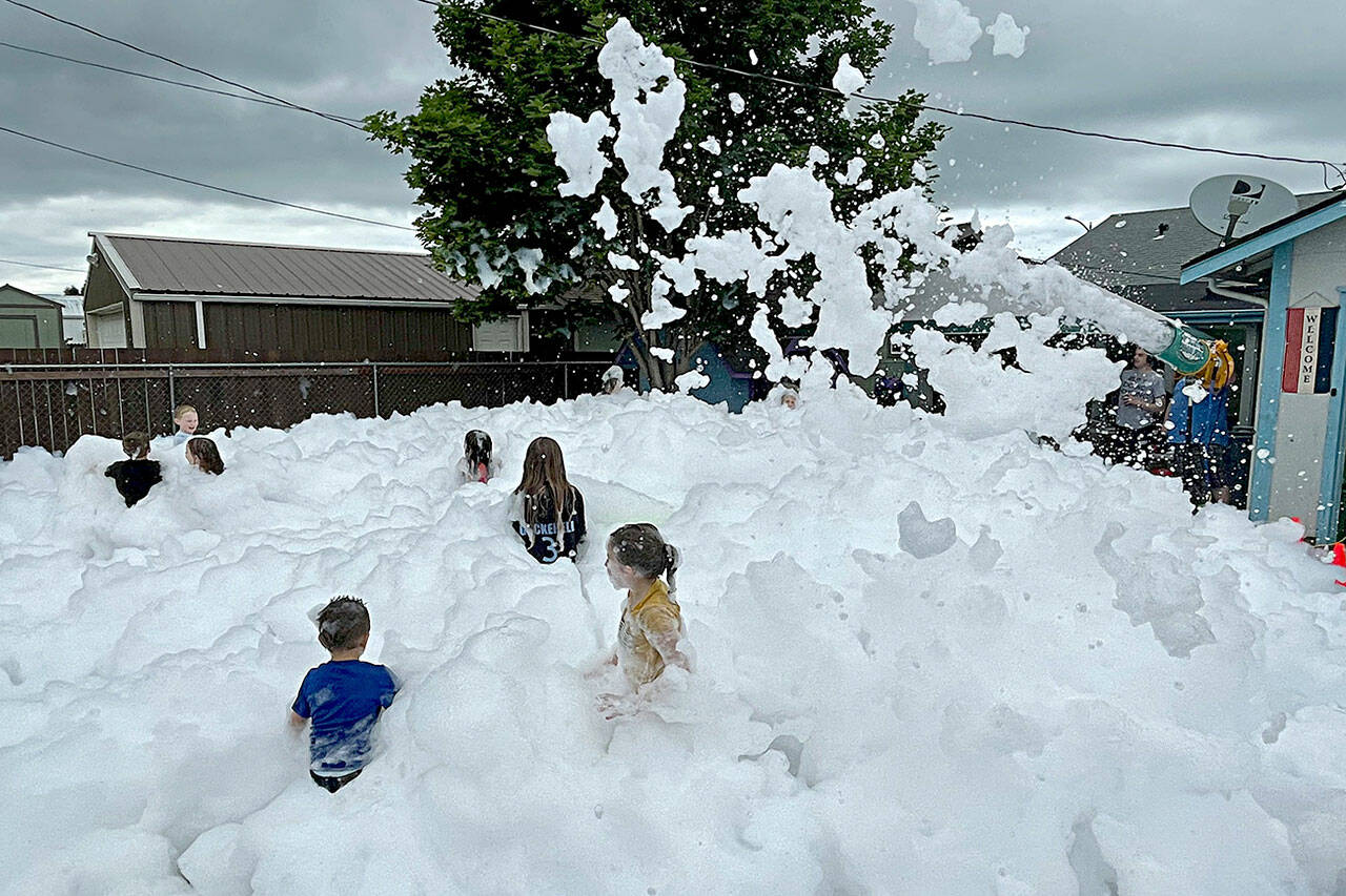 Sequim Gazette photo by Matthew Nash
Strait Up Foam Fun held its first official event filling a yard with foam in Sequim for a birthday party on June 18. Owner Nicole Merrigan looks to travel across Clallam County for private and public events.