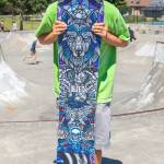 Sequim Gazette photo by Emily Matthiessen
Brian Eggiman holds the Lib Tech snowboard he won as grand prize in a raffle fundraising for repairs and expansion of Sequims Carrie Blake Skatepark on Saturday. Eggiman said he paid $10 for a beautiful snowboard worth $600. I feel so lucky, he said. I thought I didnt have a chance.